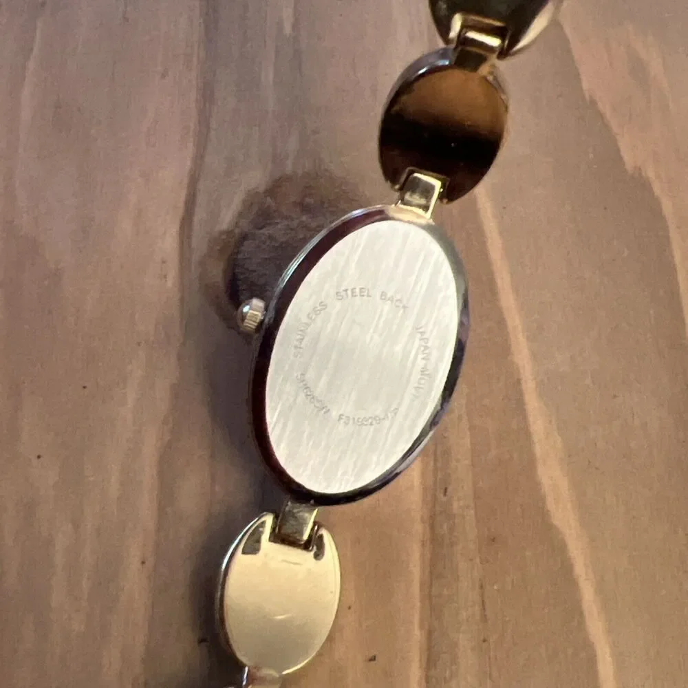 Unbranded Gold Tone Ladies Watch With Gems